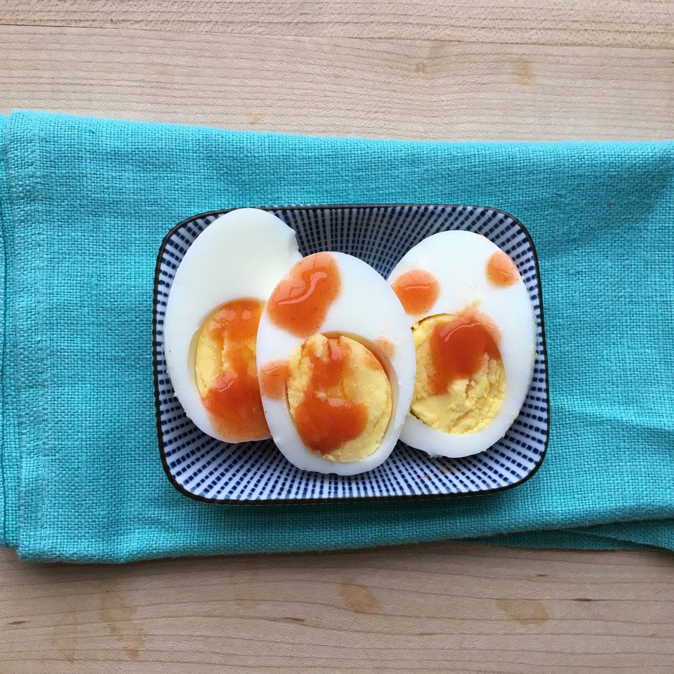 hard boiled egg with sauce