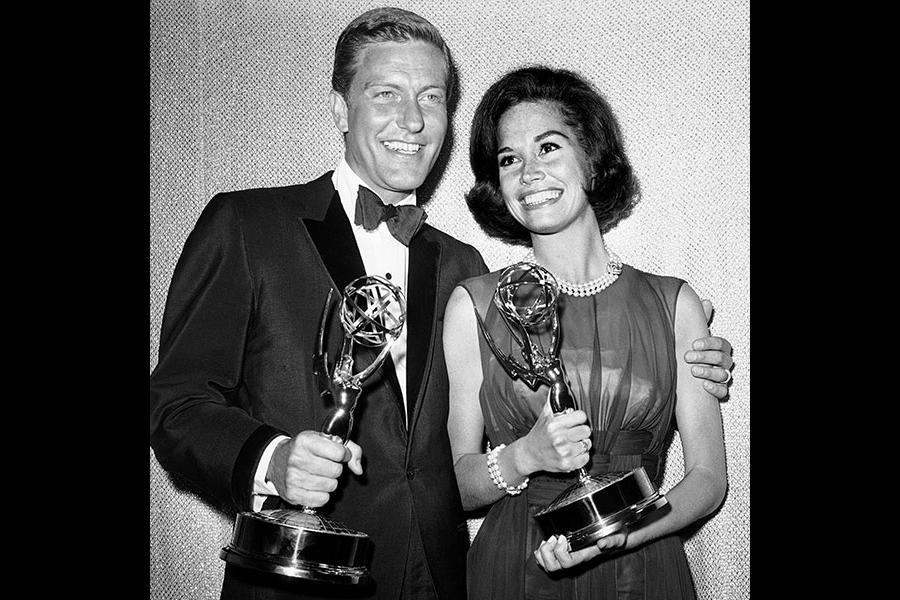 Dick Van Dyke and Mary Tyler Moore with their Emmys at the 16th Emmy Awards.
