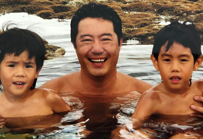 Young Mark with his father and brother