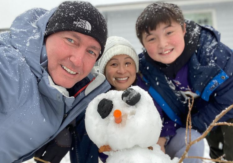 Jenni Lee with her husband and son