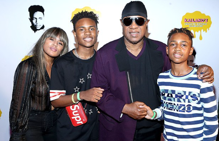 Kai Milla and Stevie Wonder with two sons
